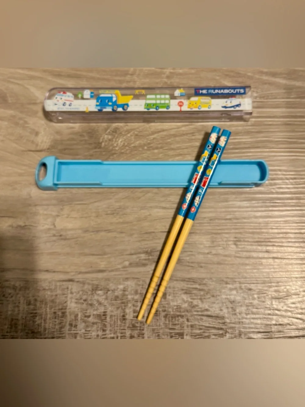 “The Runabouts” blue chopstick set. Includes children’s chopsticks and